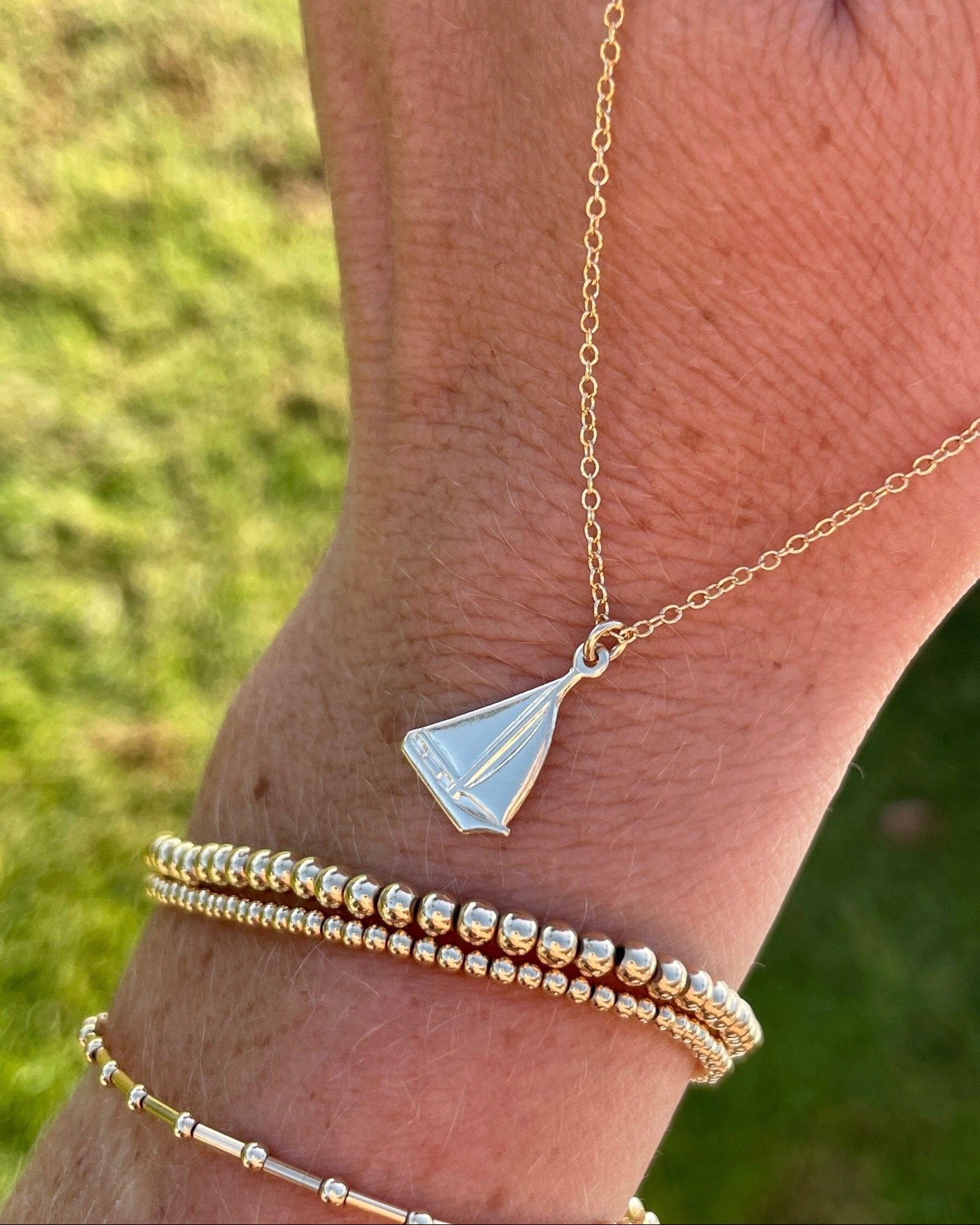 Small Gold Charm Necklace by Hannah May Jewelry