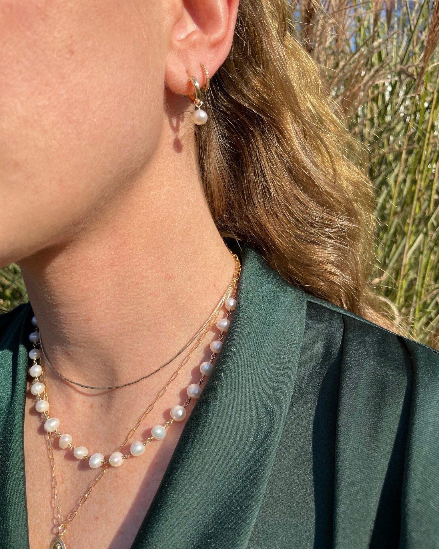 Pearl Huggie Hoop Earrings by Hannah May Jewelry