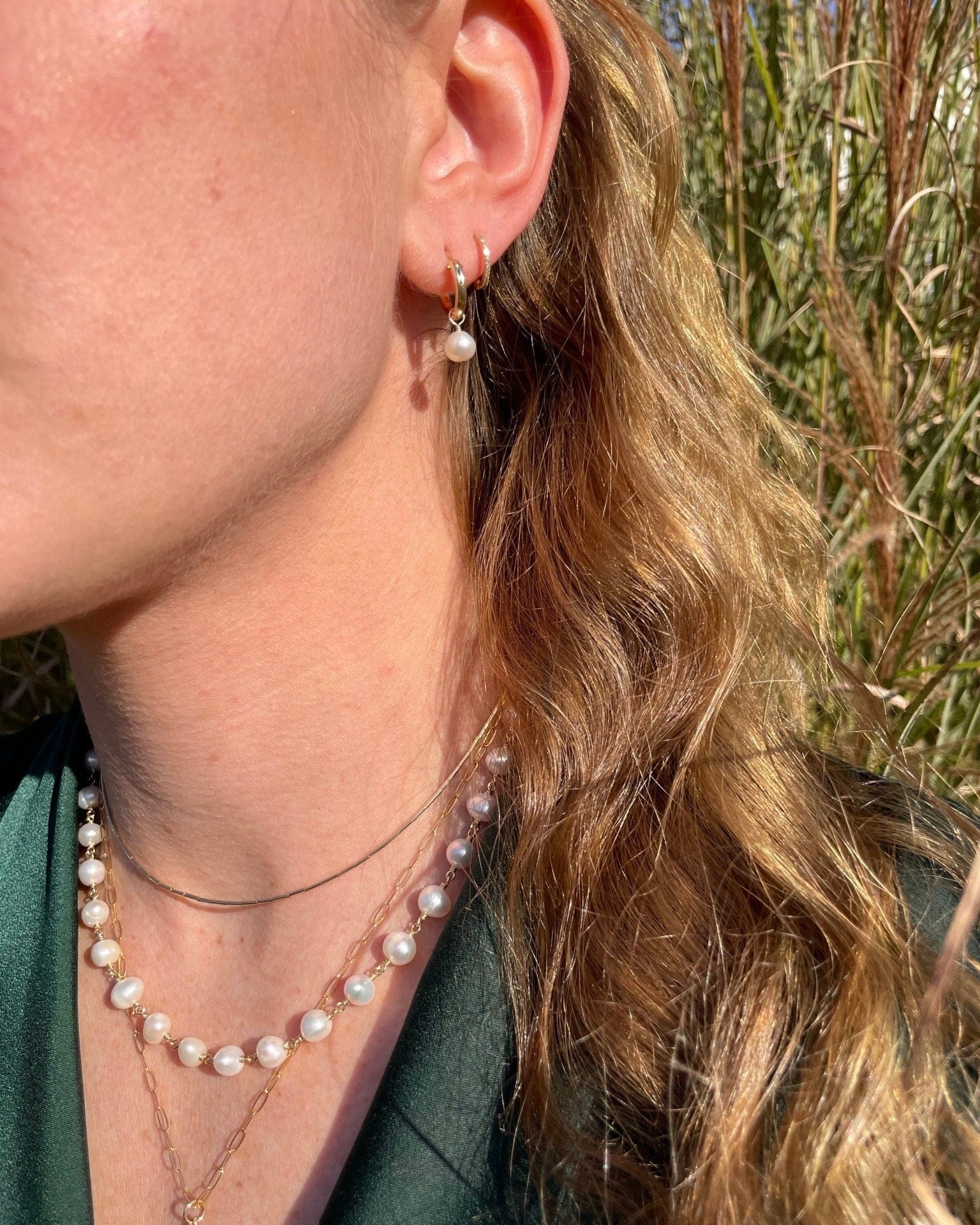 Pearl Huggie Hoop Earrings by Hannah May Jewelry