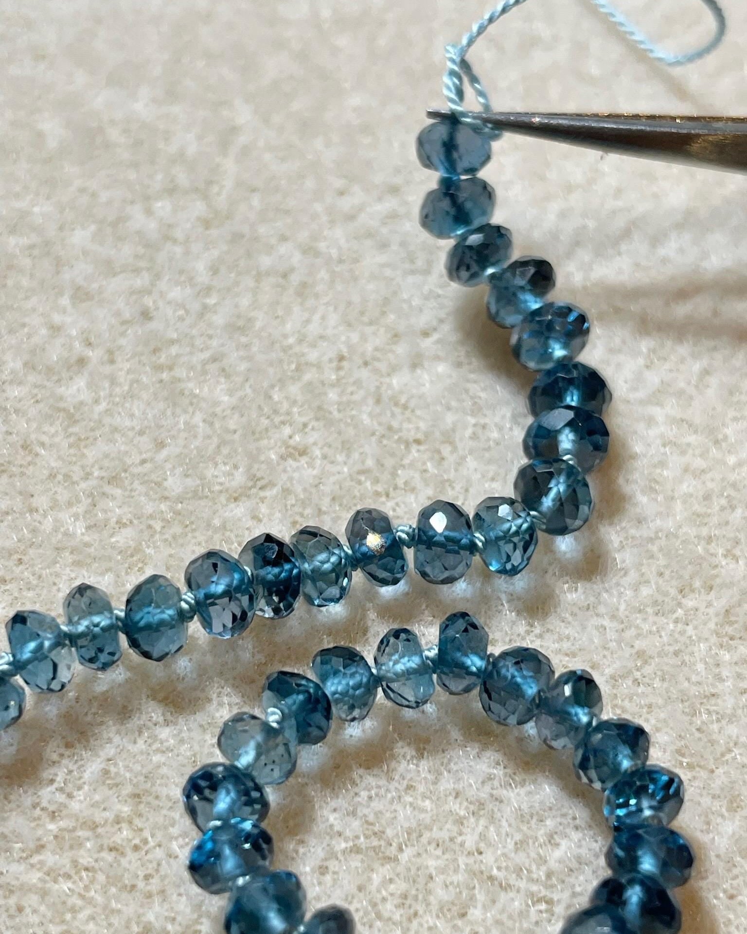 London Blue Topaz Silk Knotted Necklace by Hannah May Jewelry
