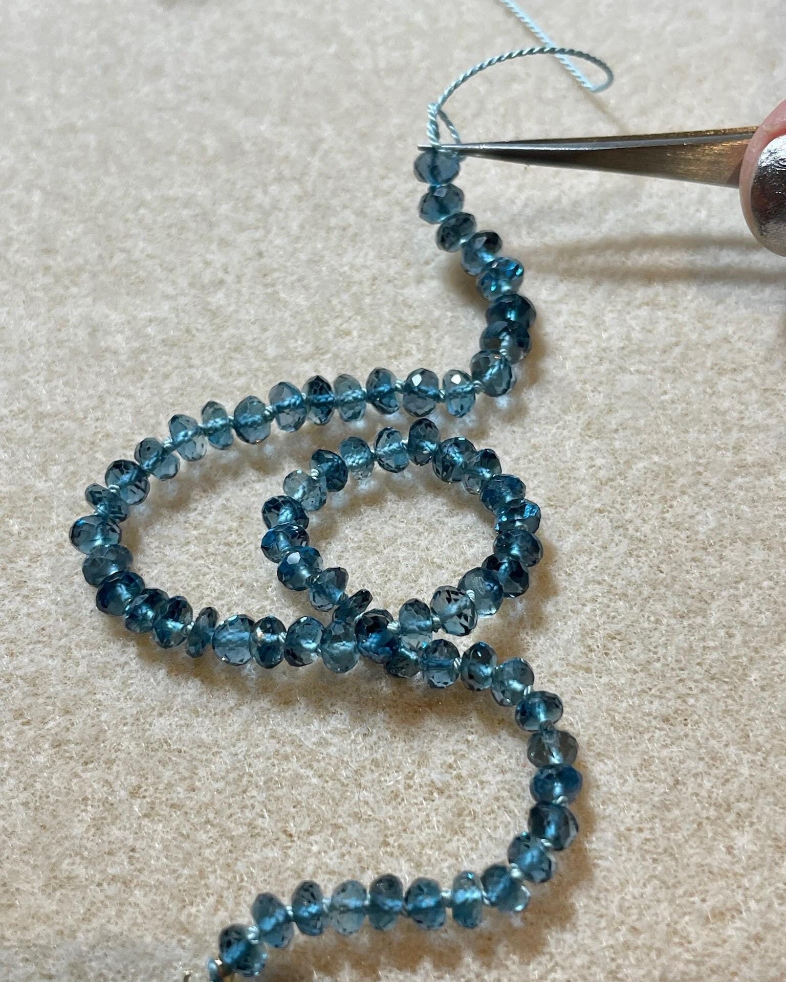 London Blue Topaz Silk Knotted Necklace by Hannah May Jewelry