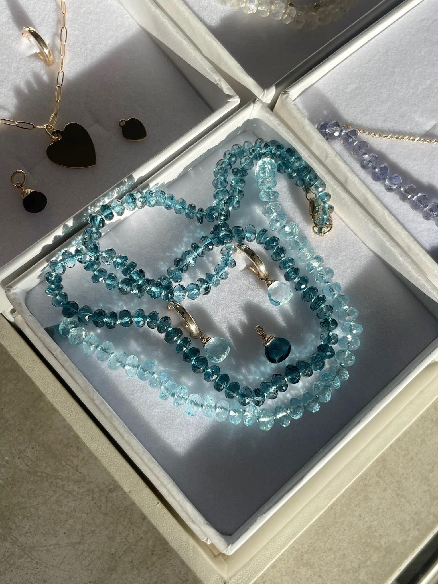 Sky Blue Topaz Huggie Hoop Earrings – December Birthstone, 14k Gold-Filled or Sterling Silver, 12mm Hannah May Jewelry