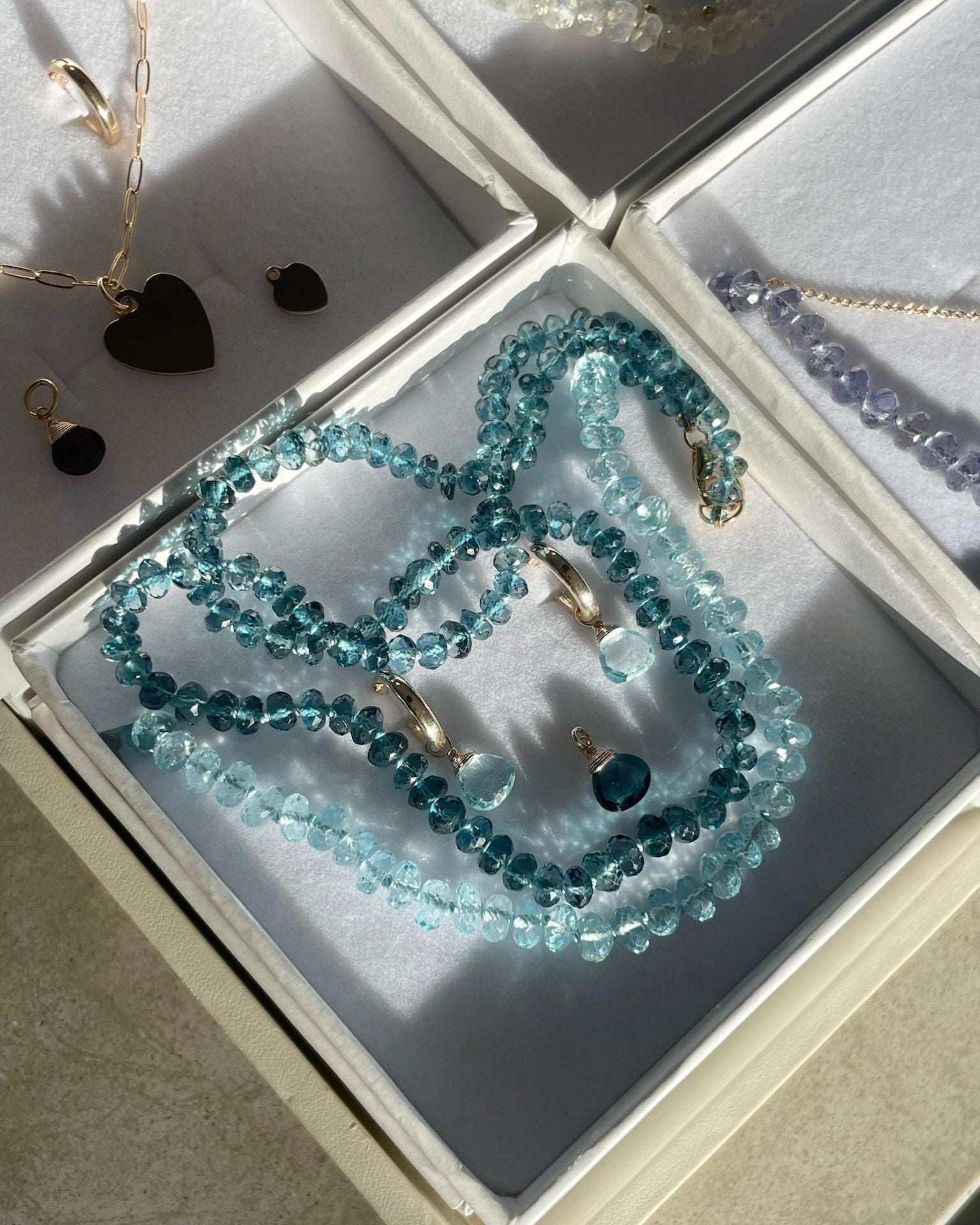 Sky Blue Topaz Huggie Hoop Earrings – December Birthstone, 14k Gold-Filled or Sterling Silver, 12mm Hannah May Jewelry