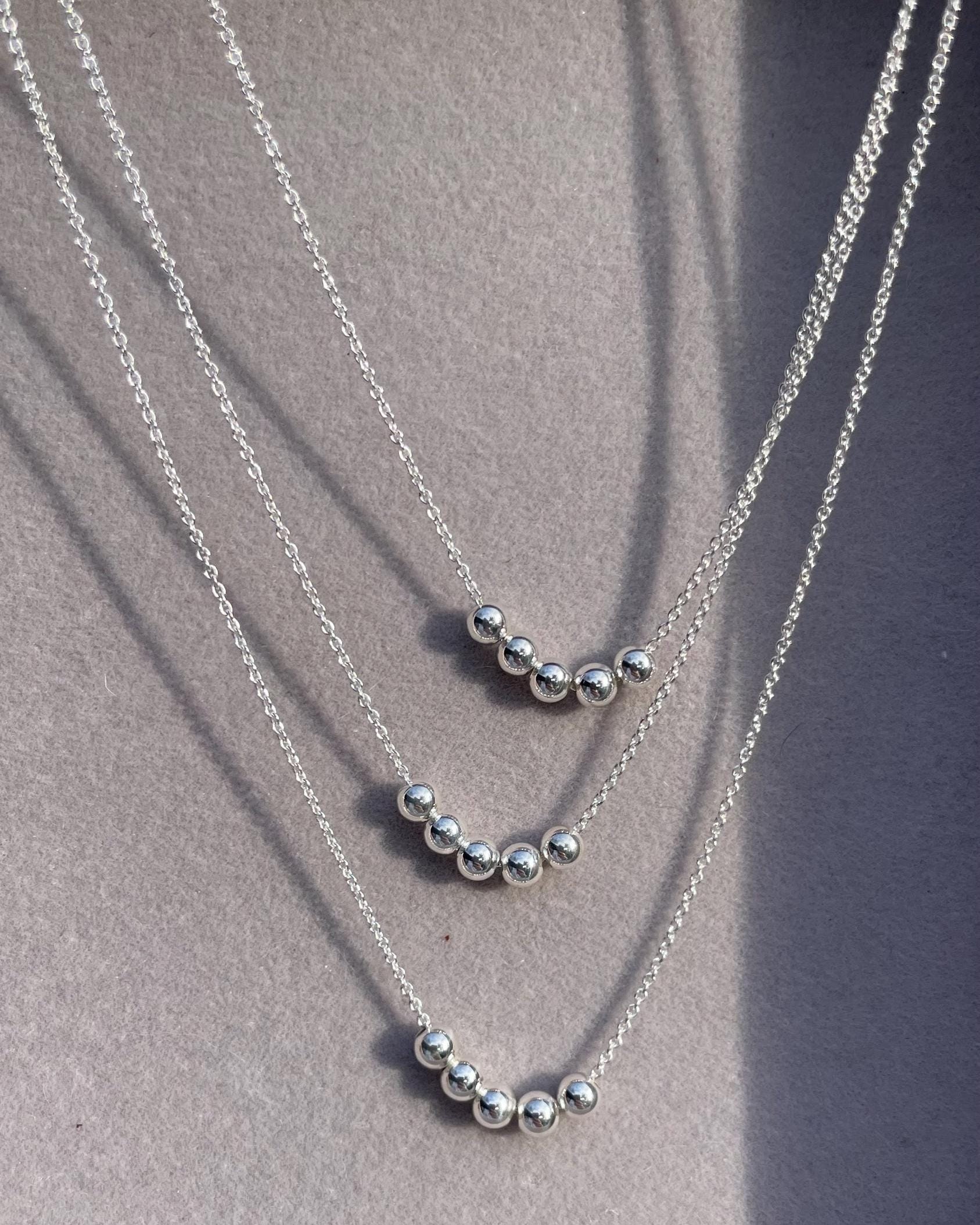 Gold Bead Fidget Necklace by Hannah May Jewelry