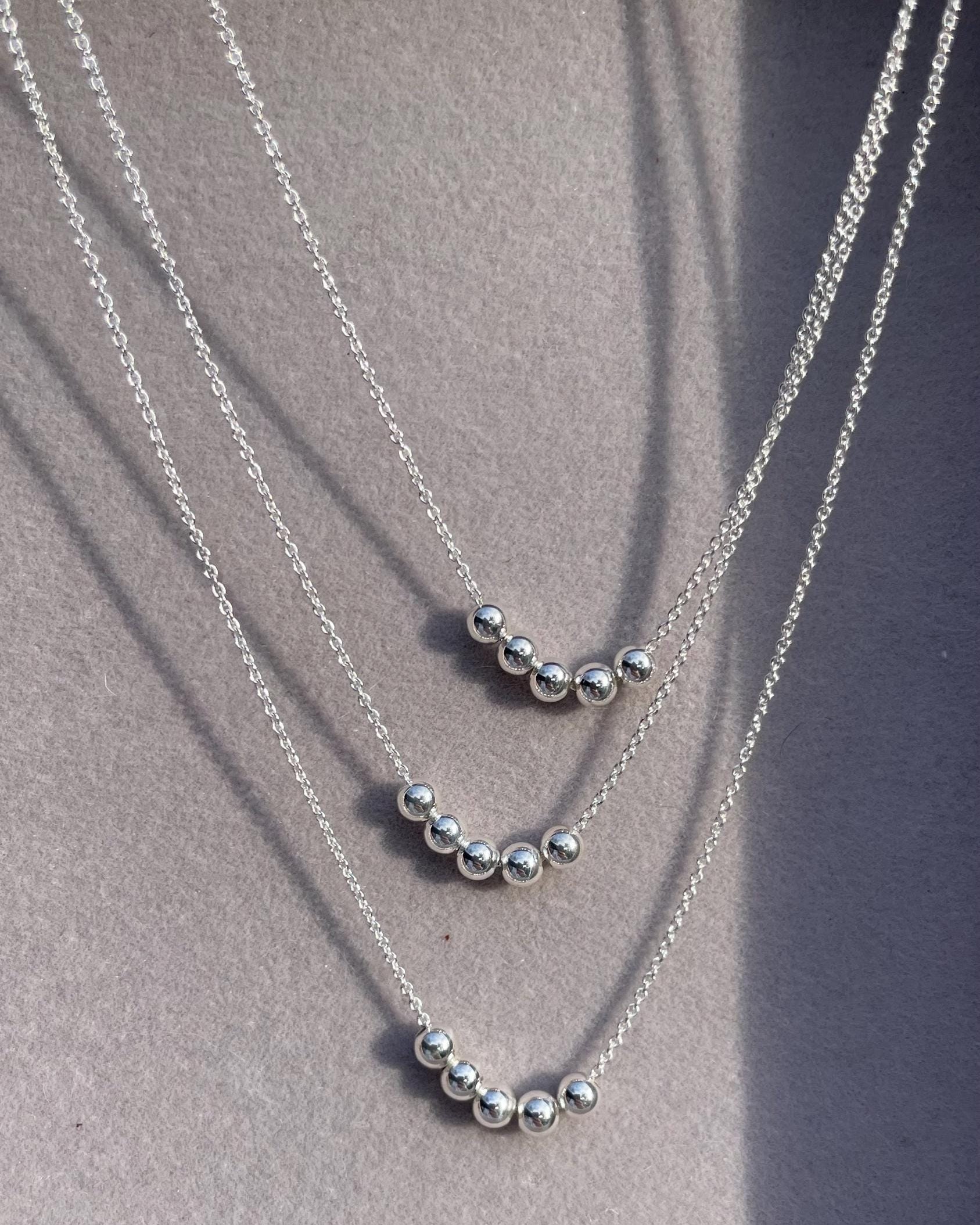 Gold Bead Fidget Necklace by Hannah May Jewelry