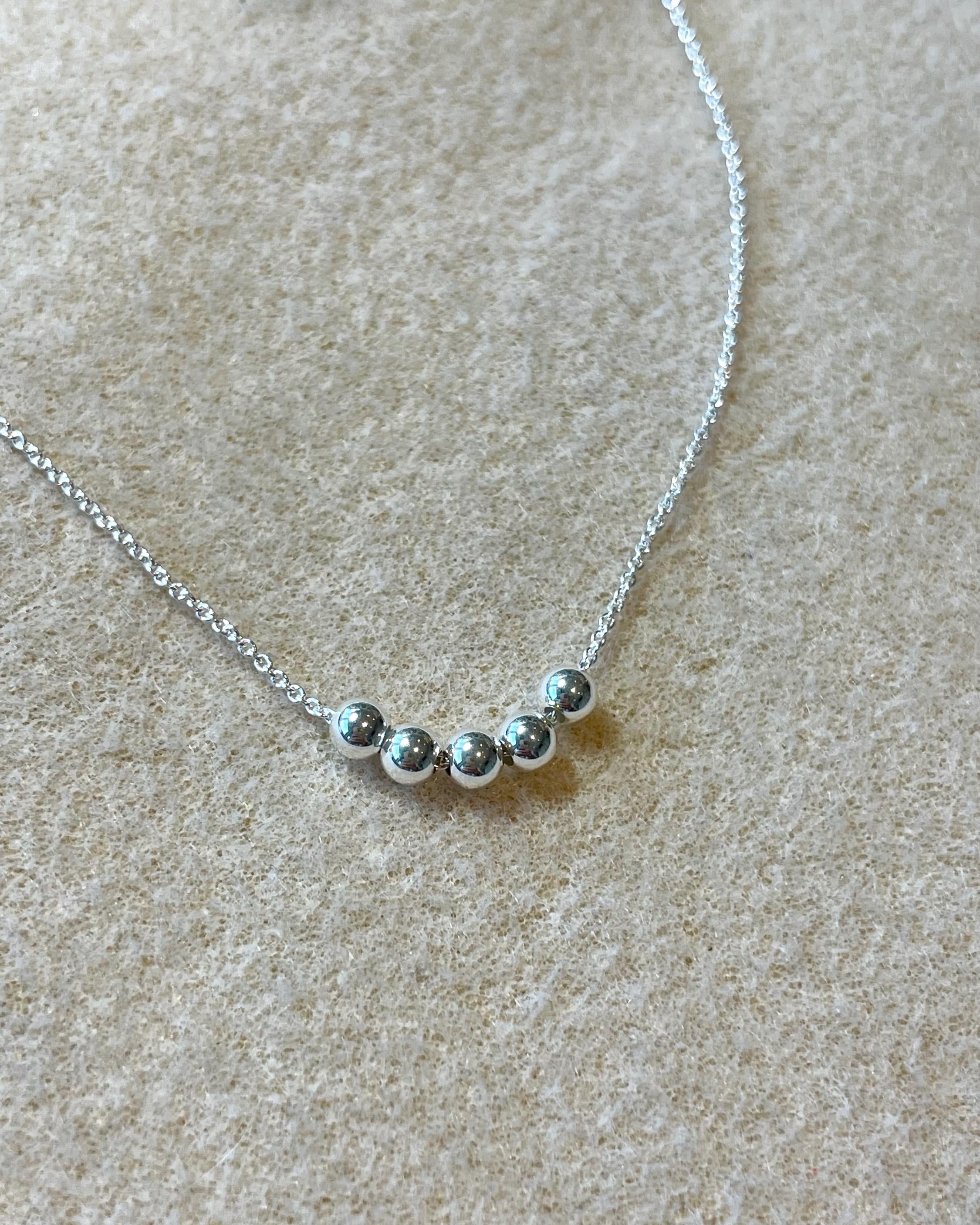 Gold Bead Fidget Necklace by Hannah May Jewelry