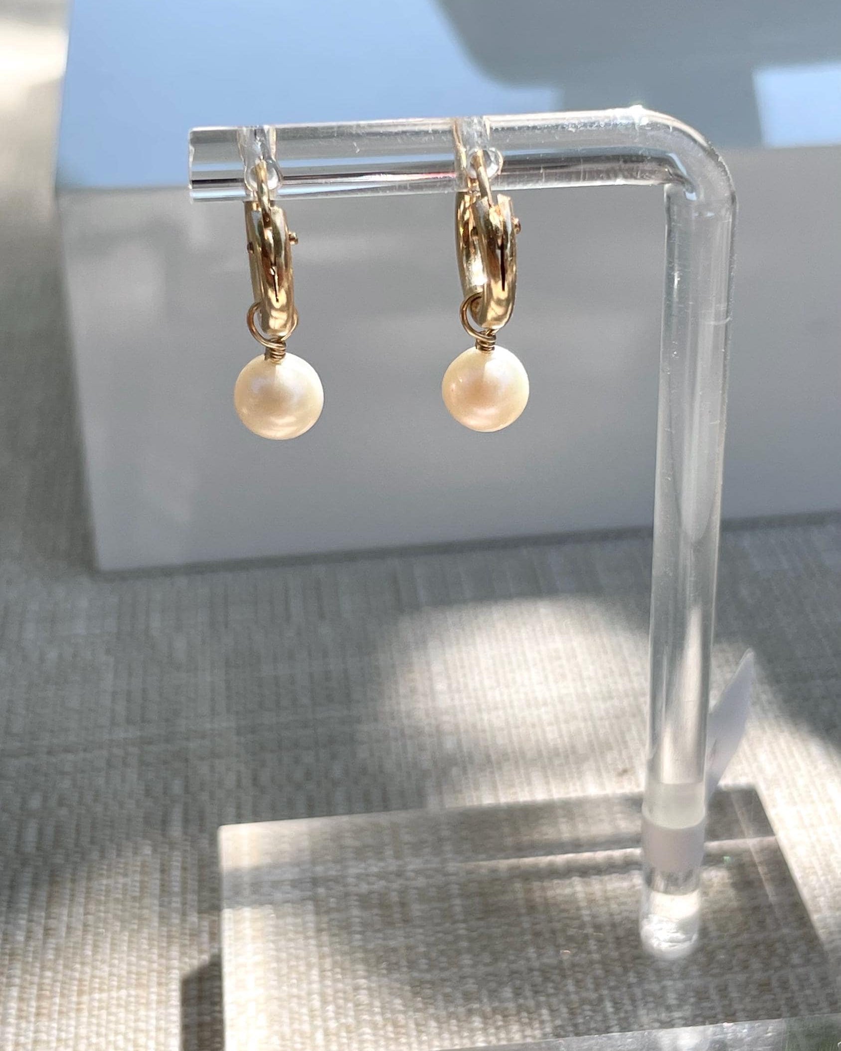 Pearl Huggie Hoop Earrings by Hannah May Jewelry